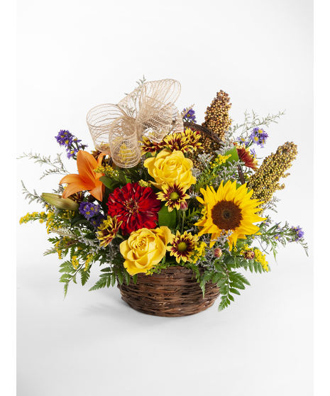 fall-toned basket of seasonal flowers