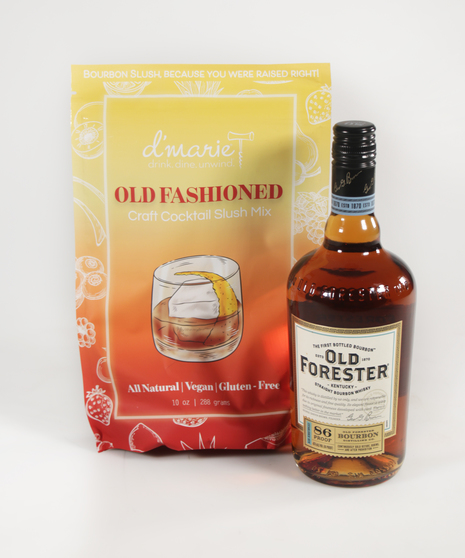 old forrester whisky next to an old fashioned cocktail slush mix bag