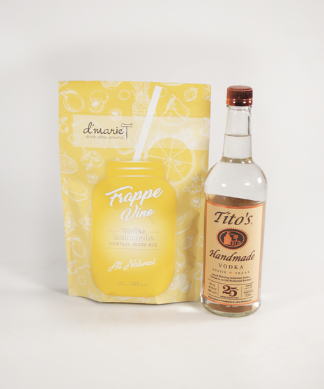 Bottle of Titos vodka next to the bag of frozen cocktail mx